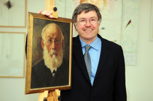 Martin Bax with his grandfather's artwork