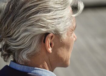 Wearing today’s hearing aids to keep you young!