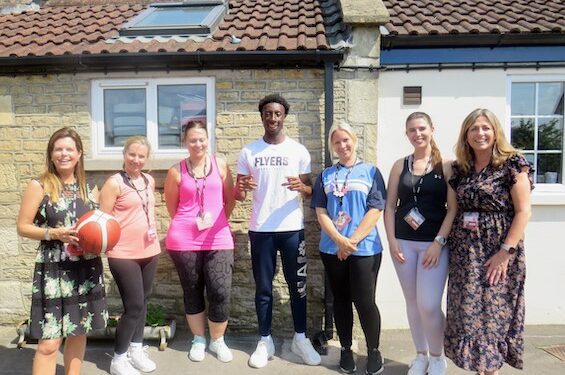 Pro basketball player visit inspires schoolchildren