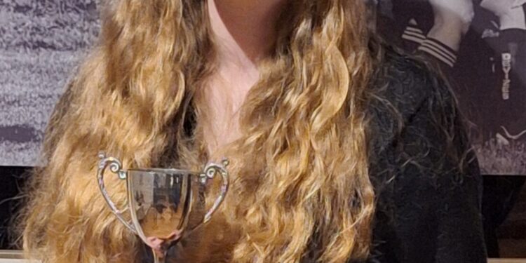 Teen tennis player honoured for inspiring young players