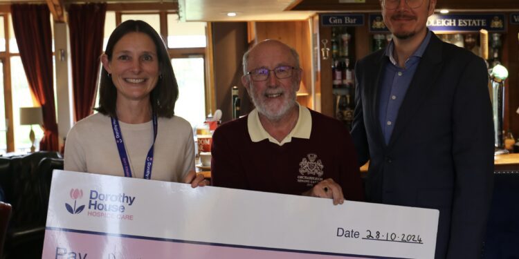 Golf club presents charity cheque to hospice fundraisers