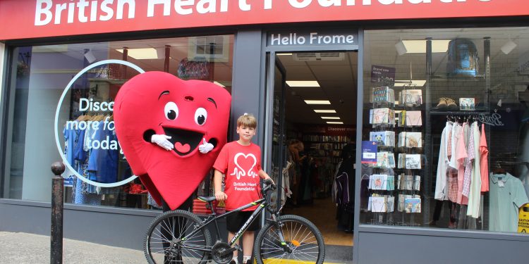 Nine-year-old boy cycles 153 miles for heart charity in memory of dad