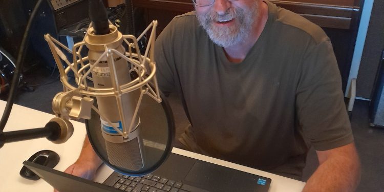 Local author records audiobook in the Cheese and Grain studio