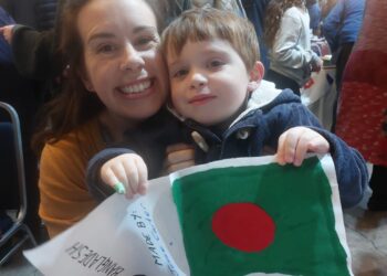 Children celebrate cultural diversity with handcrafted flags