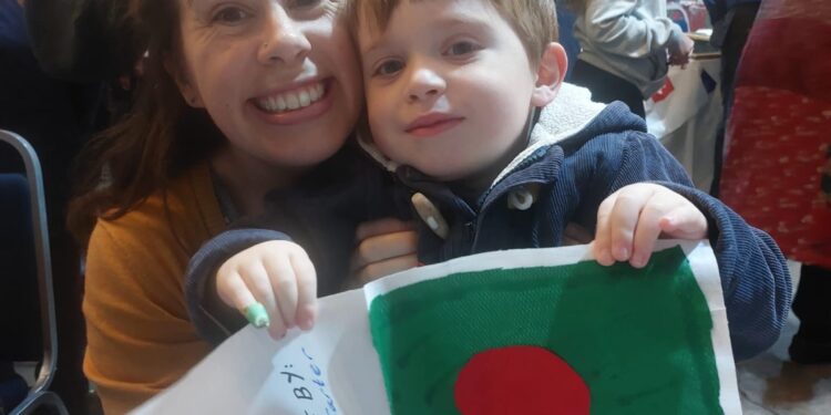 Children celebrate cultural diversity with handcrafted flags